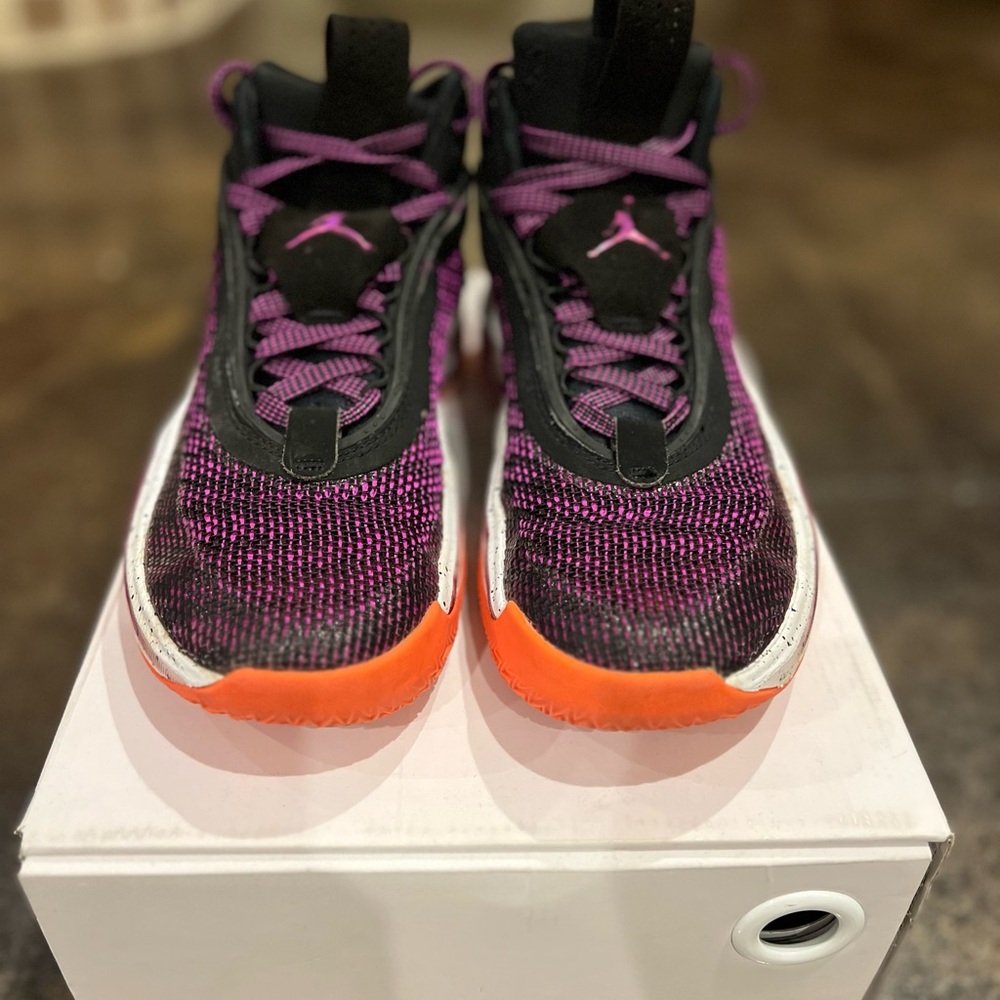 Jordan XXXVI Sneakers in Purple and Black with Orange Soles